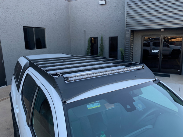 Top view of Economy Roof Rack on a white Toyota Tacoma - Cali Raised LED